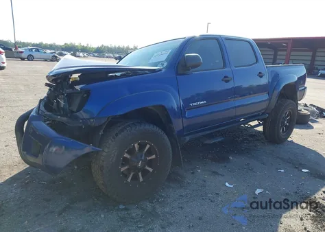 2015 Toyota Tacoma Base V6 z USA, uszkodzony, nr VIN 5TFLU4EN1FX122847